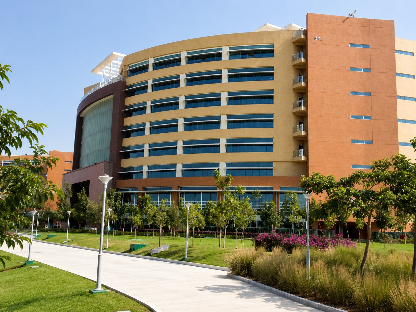 Infosys Hyderabad — entrance arch, ground level view with gardens and walkway